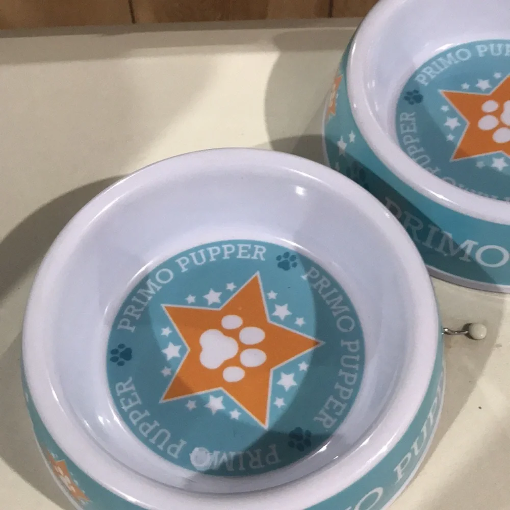 2 round dog bowls and one with 2 bowls.